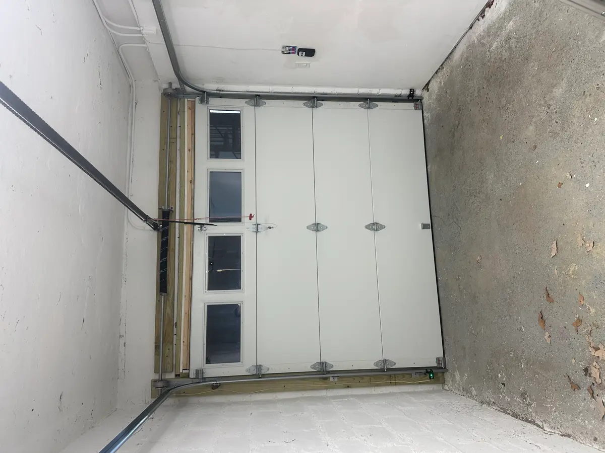 Insulated garage door interior installation